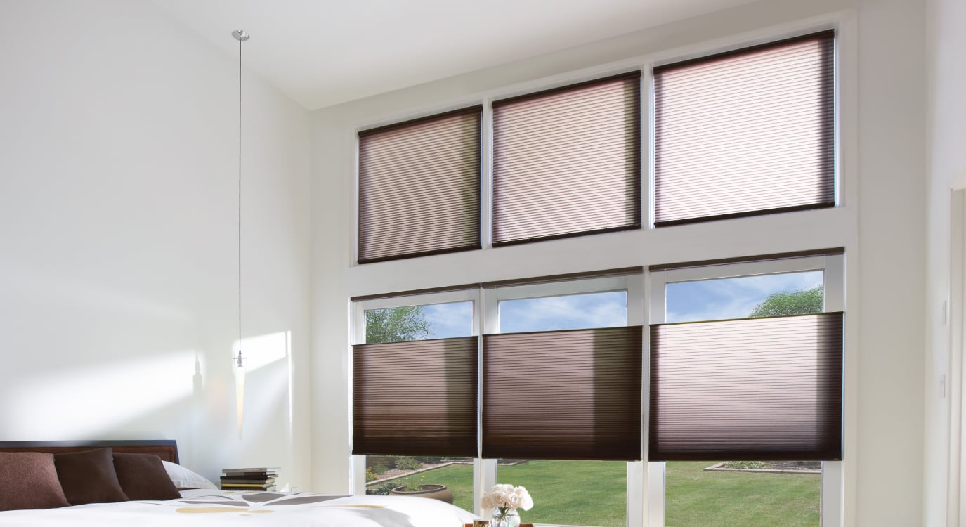 Cellular shades in a high window